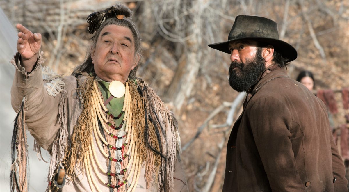 Graham Greene as Spotted Eagle and Tim McGraw as James of the Paramount+ original series 1883.