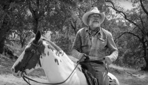 Perry King in The Divide