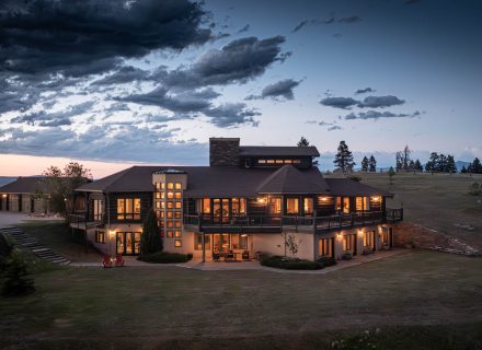Exterior of Montana's Kokopelli Ranch against the Montana sunset.