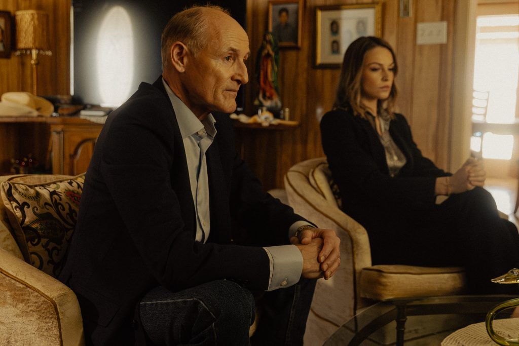 Colm Feore as Nathan and Kayla Wallace as Rebecca Savage in "Landman."