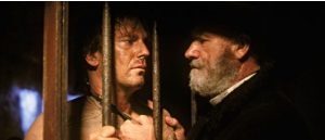 Kevin Costner and Gene Hackamn in "Wyatt Earp"