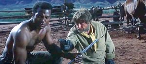 Jim Brown and Richard Boone in "Rio Conchos"