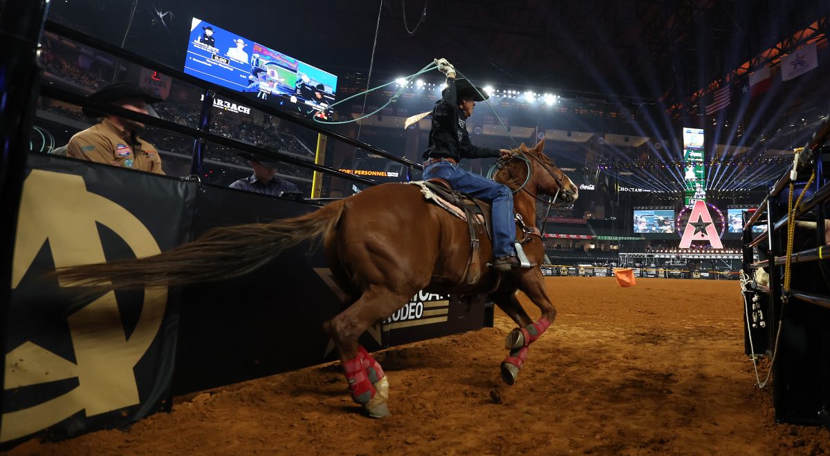 ARLINGTON, TEXAS - MARCH 09: Derrick Begay competes in the team roping event during The American Rodeo by Teton Ridge at Globe Life Field on March 09, 2024 in Arlington, Texas. (Photo by Carolyn Simancik/Getty Images for Teton Ridge)